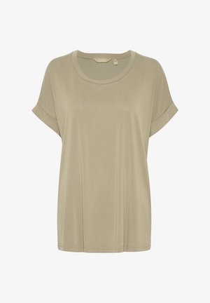 Luźna koszulka z krótkim rękawem w jasnym beżu. Wykonana z miękkiego materiału, z okrągłym dekoltem i podwiniętymi rękawami. Prosty i schludny design.