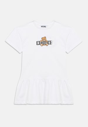 Bela bombažna majica z nagubanim robom. Na sprednji strani je grafika medveda in napis "MOSCHINO" v črni in oranžni barvi. Kratki rokavi.