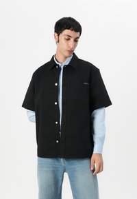Calvin Klein Jeans UTILITY RELAXED SHIRT - Button down-skjorte - black