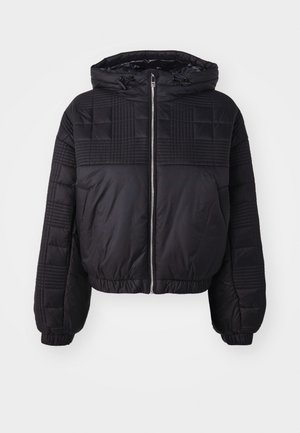 Black puffer jacket with quilted texture, a hood, and elastic cuffs. Features a front zip closure and a cropped design.
