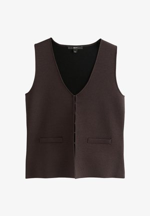 Brūns adīts bezrūpīgs, ar dziļu V veida apkakli, priekšpuses pogu aizdari un divām horizontālām kabatām. Gluda tekstūra un vienkāršs dizains.