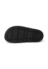 Semelle de chaussure en caoutchouc noir avec motifs de grip texturés, comprenant des crampons profonds et une section centrale lisse pour la traction et la durabilité.