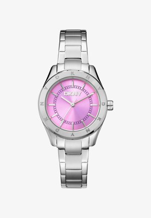 Zilverkleurig roestvrijstalen horloge met een ronde roze wijzerplaat, DKNY-logo en zilveren uur/minuutwijzers. Heeft numerieke uurmarkeringen op de bezel.