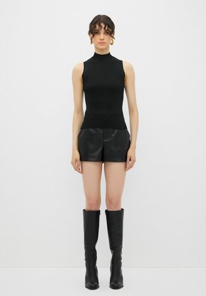 STONED TURTLENECK SLEEVELESS  - Toppi - black