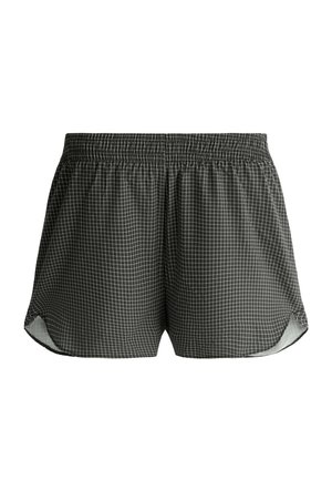 Čierno-biele malé kockované elastické šortky s oblým lemom a ľahkou látkou.