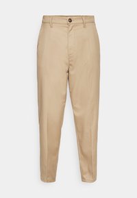 Beige skräddarsydda byxor med en slät textur, utrustade med dragkedja, knappstängning och framfickor. Rak passform med tapered anklar.