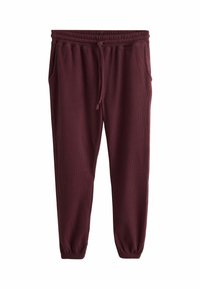 Burgundy sweatpants made of ribbed fabric, featuring an elastic waistband with a drawstring, side pockets, and tapered cuffs.