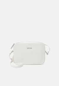 Selecionado, off white