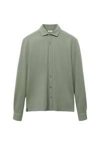 Camicia verde chiaro con colletto, maniche lunghe, dotata di una chiusura frontale con bottoni e una vestibilità ampia. Materiale morbido con dettagli di texture minimi.