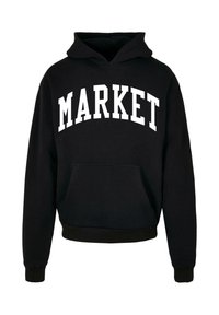 Felpa nera con cappuccio caratterizzata da una grande stampa bianca "MARKET" sul petto, con tasca frontale a marsupio e polsini a costine.