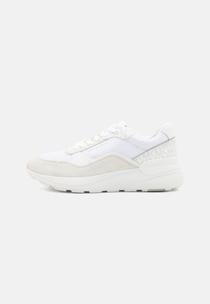 White athletic sneakers with a mesh and suede upper, featuring textured accents and a distinctive sole for cushioning.