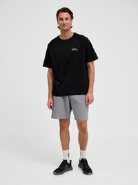 Hummel HMLTECH - Pantaloncini sportivi - grey melange