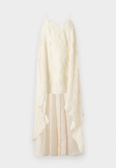 Κρεμ φόρεμα με υφή δαντέλας, βαθύ V-λαιμόκοψη και πλούσιο, στρωματοποιημένο φούστα με ακανόνιστο τελείωμα. Ρυθμιζόμενοι λεπτοί ιμάντες.