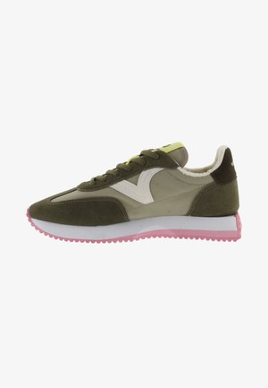 Green suede and synthetic sneaker with white accents, pink rubber sole, rounded toe, and soft interior lining. Features lace-up closure.