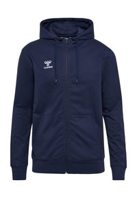 Navy zip-up hoodie made of soft fabric, featuring a drawstring hood, front pockets, and a white logo on the left chest.