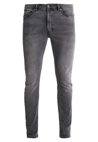 Jeans ajustados en denim gris oscuro, con cierre de botón, cinco bolsillos y un ligero desvanecimiento para una apariencia texturizada.