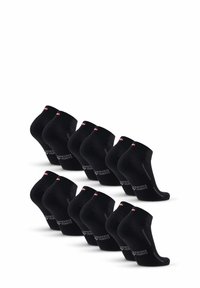 Calcetines negros hasta el tobillo con parte superior acanalada y talón reforzado, con un pequeño detalle de logo en un color contrastante. Pack de múltiples pares.