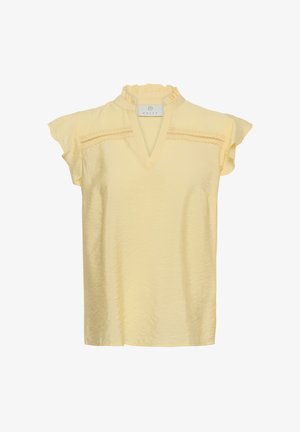 Camicia senza maniche giallo chiaro con collo alto arricciato, scollo a V e dettagli in pizzo sul petto.