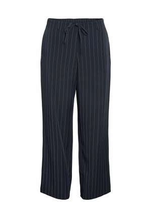 Tamsiai mėlyni, lengvi plačių kojų kelnės su baltomis vertikaliomis juostelėmis. Turi tamprų juosmenį su raišteliu, leidžiančiu reguliuoti dydį.