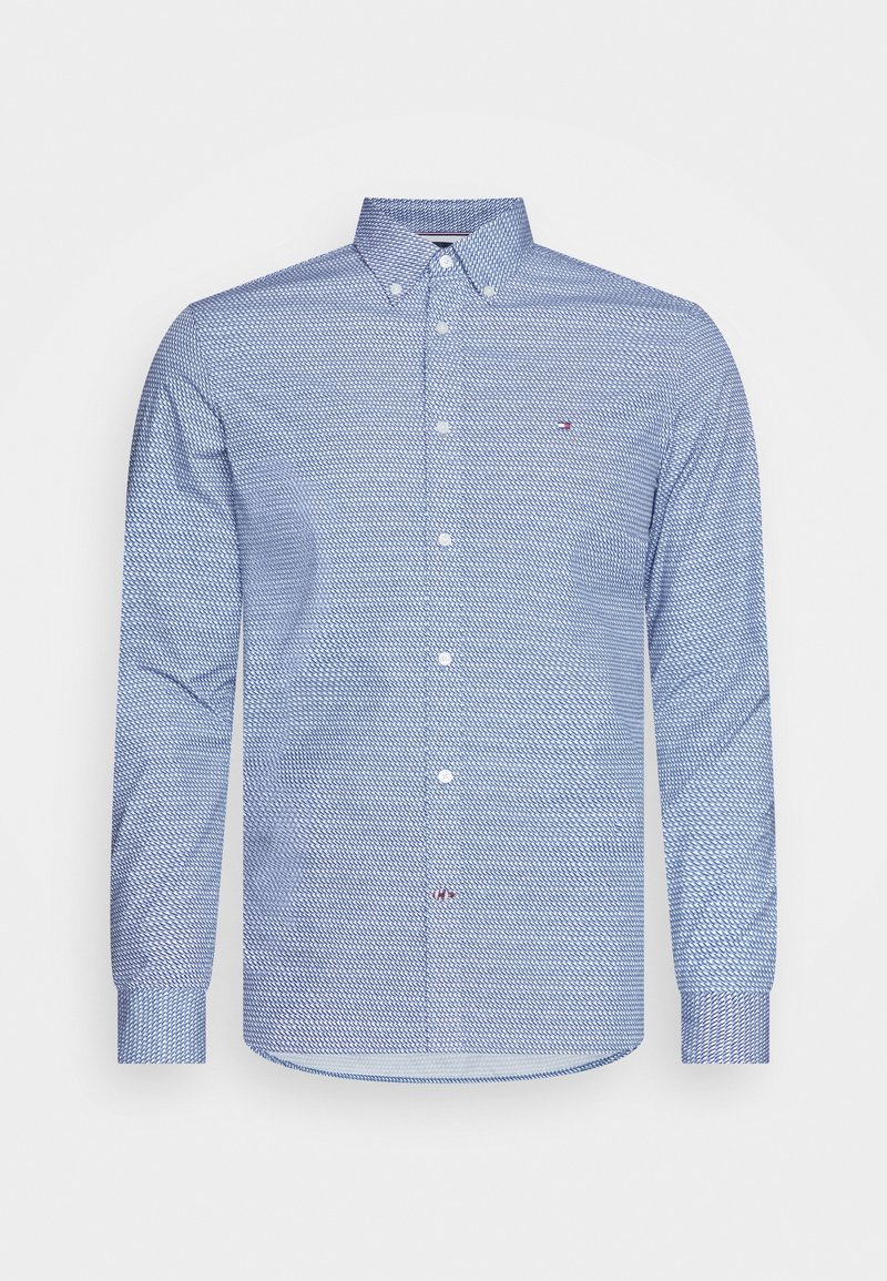 Niebieska koszula z długim rękawem na guziki, z teksturowanym wzorem, kołnierzykiem na guziki oraz wyhaftowanym logo na lewej piersi.