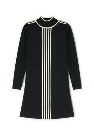 Abito in maglia nera con maniche lunghe, scollatura alta e strisce verticali bianche. Presenta elementi decorativi su spalle.
