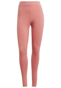 Rosa leggings med en jämn textur, hög midja och inga synliga sömmar. Har en liten vit logotyp på vänstra låret.