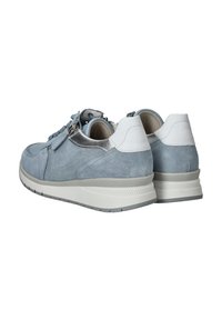 Light blue suede sneakers with white and silver accents, featuring a textured sole and lace-up design. Visible stitching along the edges.