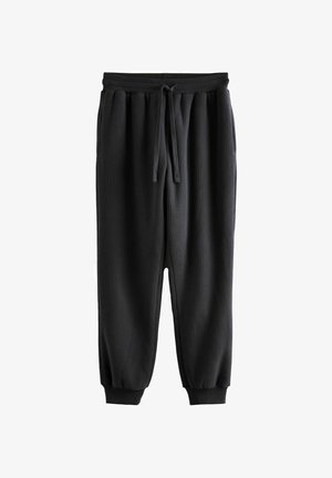 Black ribbed jogger pants with an elastic waistband and drawstring, featuring tapered legs and knit cuffs at the ankles.
