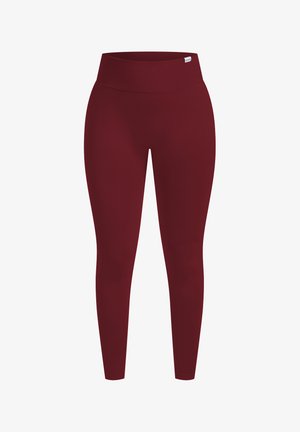 Burgunderfarbene Leggings mit hohem, geripptem Bund, gefertigt aus dehnbarem Stoff. Das Design ist körperbetont ohne sichtbare Muster oder Akzente.