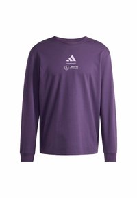 Purple long-sleeve T-shirt made of cotton, featuring white Adidas and Mercedes logos on the front. Round neck and ribbed cuffs.