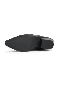 Black shoe sole with a pointed shape, featuring a textured surface and ridges for grip. Smooth finish around the edges.