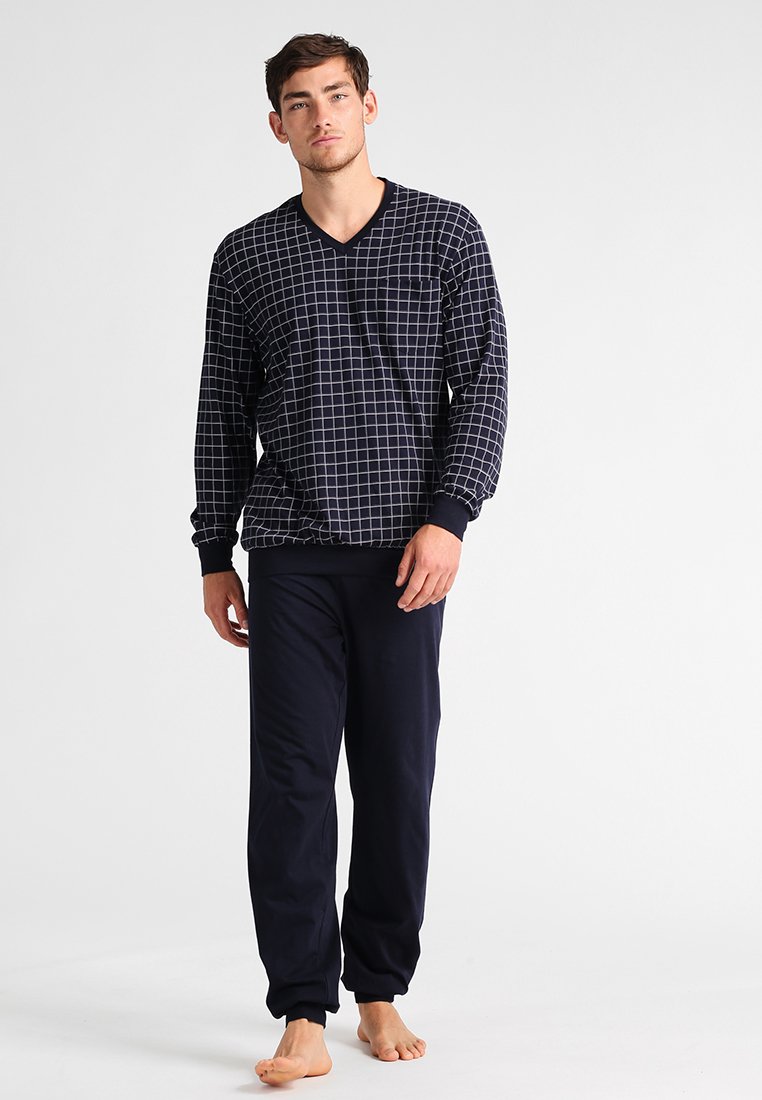 Navy checkered pajama set featuring a V-neck long-sleeve top and solid navy pants. Made from soft fabric with elastic cuffs at the wrists.