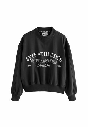Zwarte sweatshirt van zacht materiaal, met een ronde hals, lange mouwen en een elastische onderrand. Voorzijde met witte tekstprints.