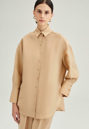 Blúzka so zapínaním na gombíky - beige