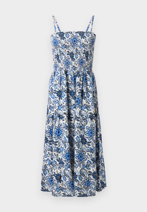Blaue und weiße florale Midikleid mit dünnen Trägern. Verfügt über einen gerafften Oberteil und einen fließenden Rock mit einem aufwendigen botanischen Muster.