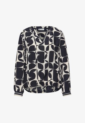 Blouse met lange mouwen met een zwart-wit abstract geometrisch patroon, elastische zoom en gestreepte manchetten.
