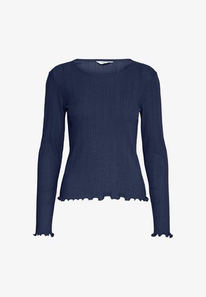 Námornícky top s dlhým rukávom vyrobený z rebrovanej látky. Má okrúhly výstrih a vlnkovaný lem, s hladkými textúrovanými rukávmi.