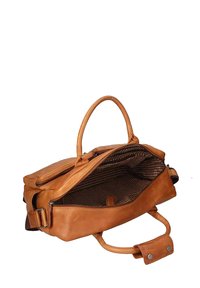 Tassen van bruin leer met een ritssluiting, met een gestructureerde geblokte binnenkant en een stevige handgreep, ontworpen voor multifunctioneel gebruik.