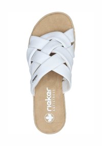 White leather slip-on sandal with crisscross strap design. Soft tan insole features branding. Flat sole, minimalist style, and smooth texture.