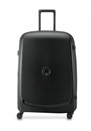 Black hardshell suitcase with a perforated texture, retractable handle, and four wheels. Features a circular logo at the center.