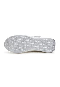 White shoe sole featuring a textured pattern of small pyramids; smooth edges with a grey accent. Clean design, suitable for casual wear.