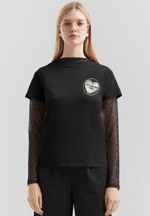 MIT KLEINEM FRONTPRINT - T-Shirt print - schwarz