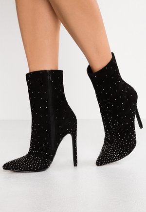 Enkellaarsjes met hoge hak - black