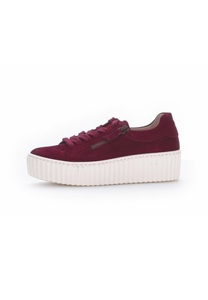 Burgundy suede platform sneaker with ribbed white sole, thick laces, and side zipper detail, shown in profile on white background.