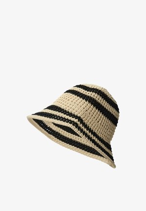 Sombrero tipo bucket de ganchillo a rayas en beige y negro con un ala ancha y ligeramente caída.