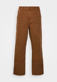 Bruna bomullsbukser med avslappnad passform, med sidfickor, kontrasterande sömmar och breda ben.