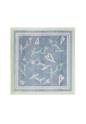 L'assiette en céramique présente un fond bleu avec un motif texturé. Décorée de cœurs manuscrits blancs et vert clair ainsi que de texte.