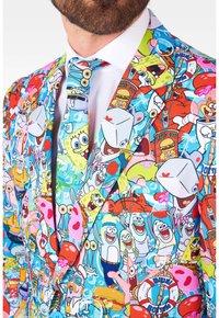 Colorful suit featuring a vibrant print of cartoon characters on a light blue background, with matching tie, designed with a playful pattern.