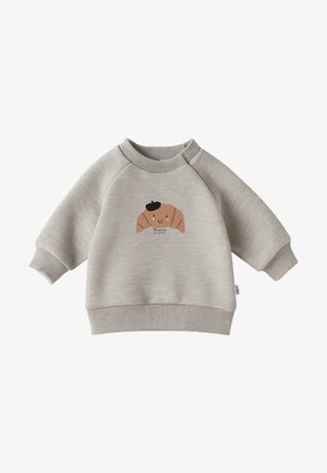 Light gray sweatshirt with ribbed cuffs and hem, featuring a cartoon croissant graphic with a beret and text "Bonjour." Soft fabric texture.
