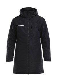 Schwarze wasserdichte Jacke mit hohem Kragen, langen Ärmeln, durchgehendem Reißverschluss und einer Seitentasche. Mit "CRAFT"-Logo auf der Brust.